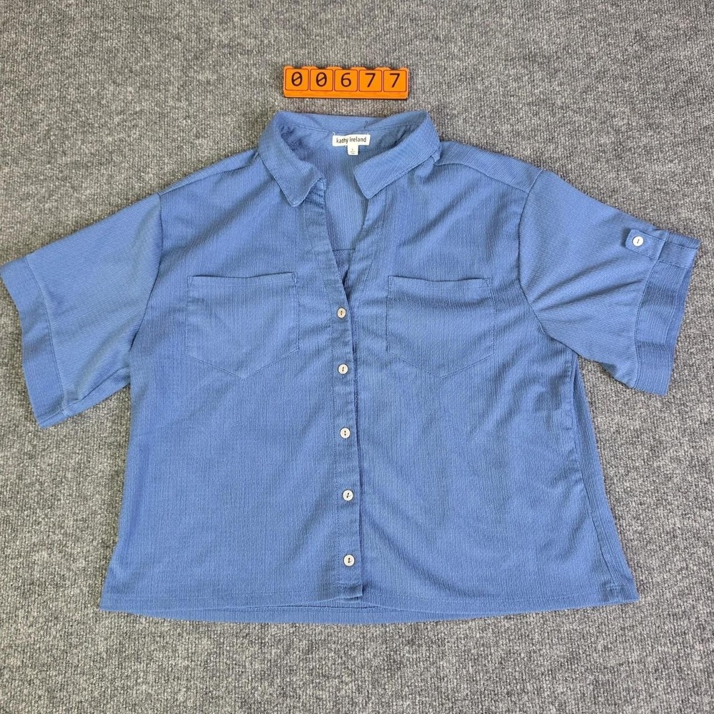 Kathy Ireland blue short sleeve button up shirt with vertical texture pattern